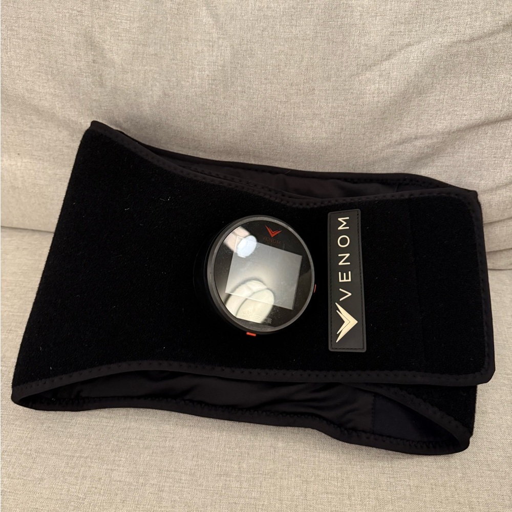 Black Wearable Heat and Vibration Device